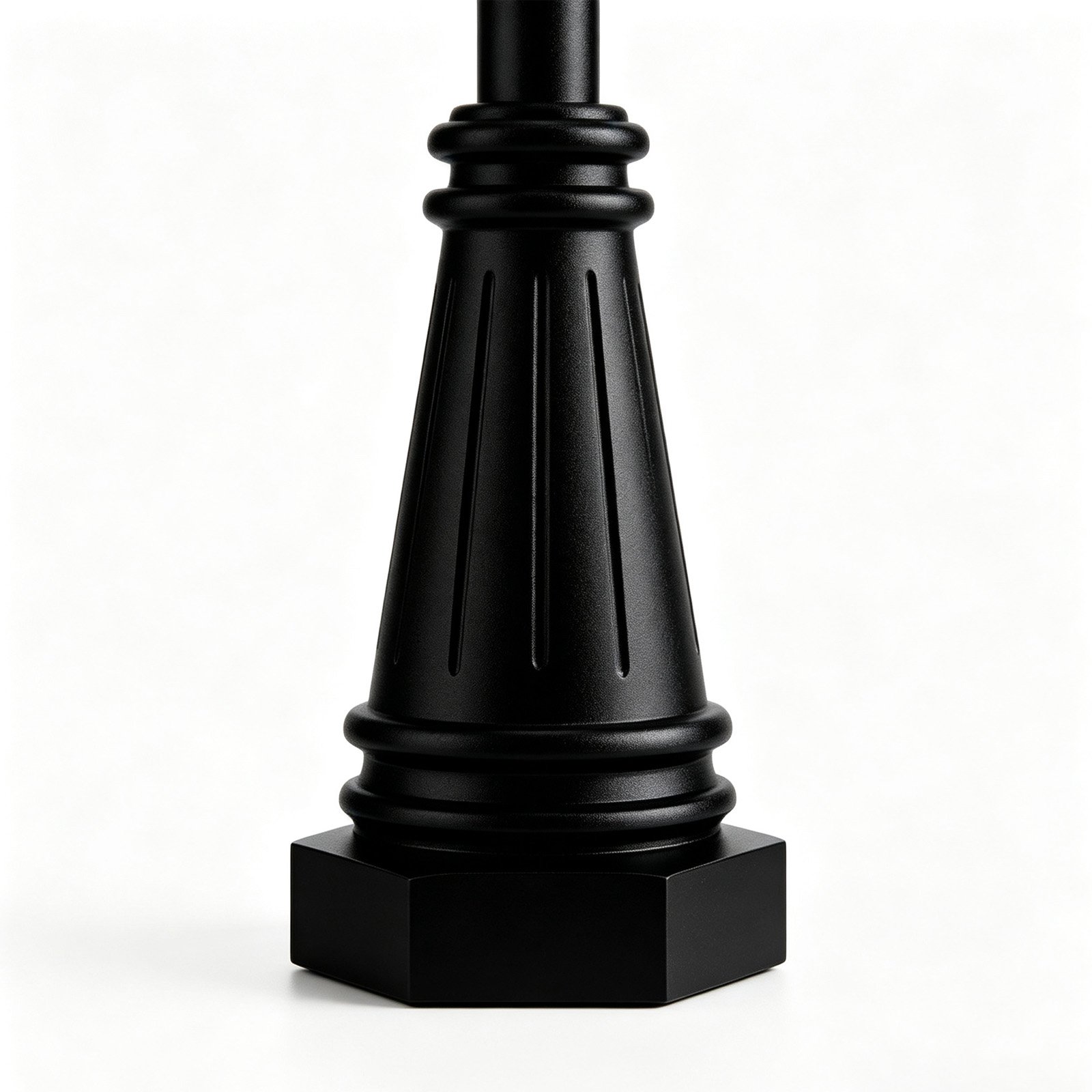 Aluminum lamp base partial shot, hexagon mounting base and tapered body detail