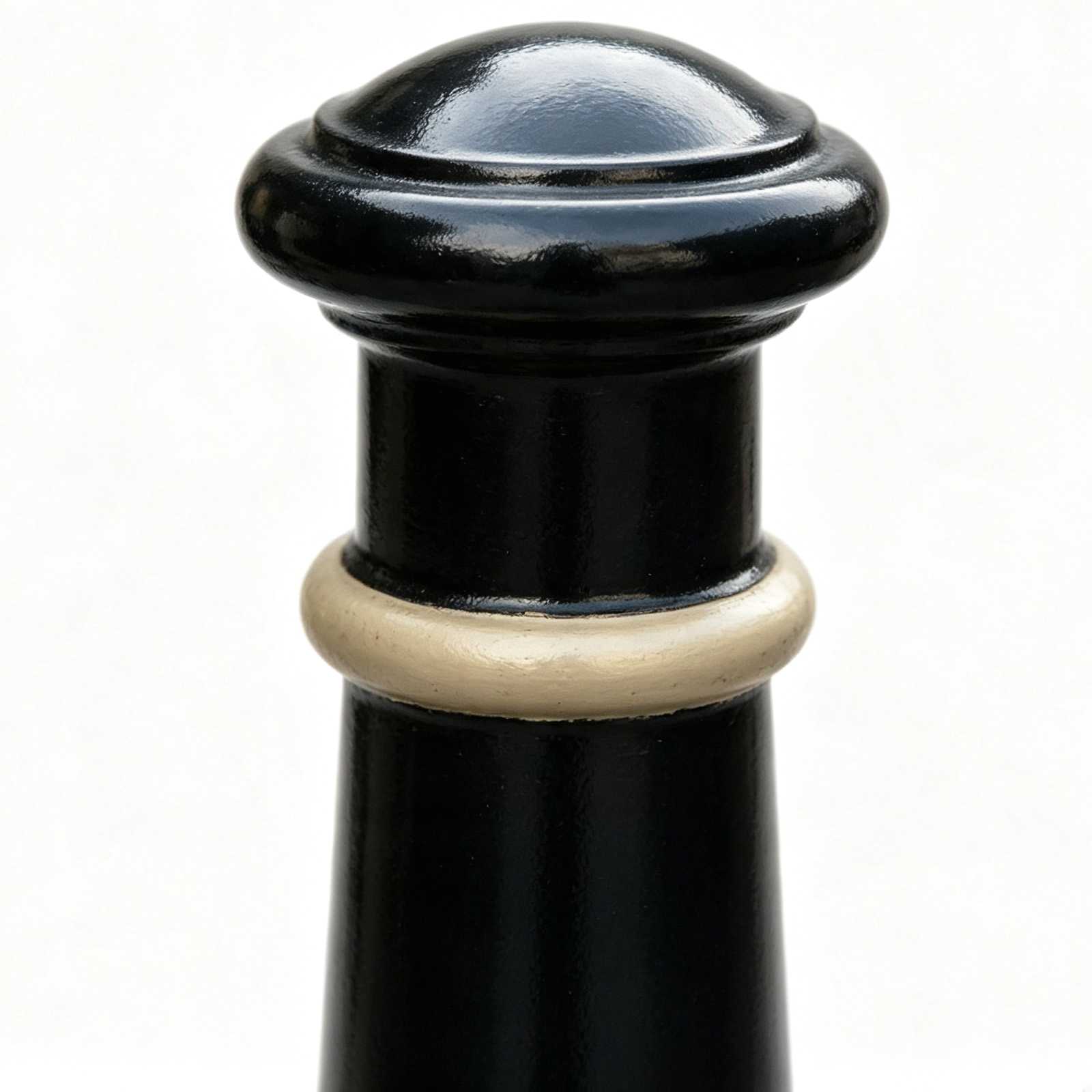 Close‑up top detail of HS‑CB011 cast iron bollard, dome cap and decorative accent ring