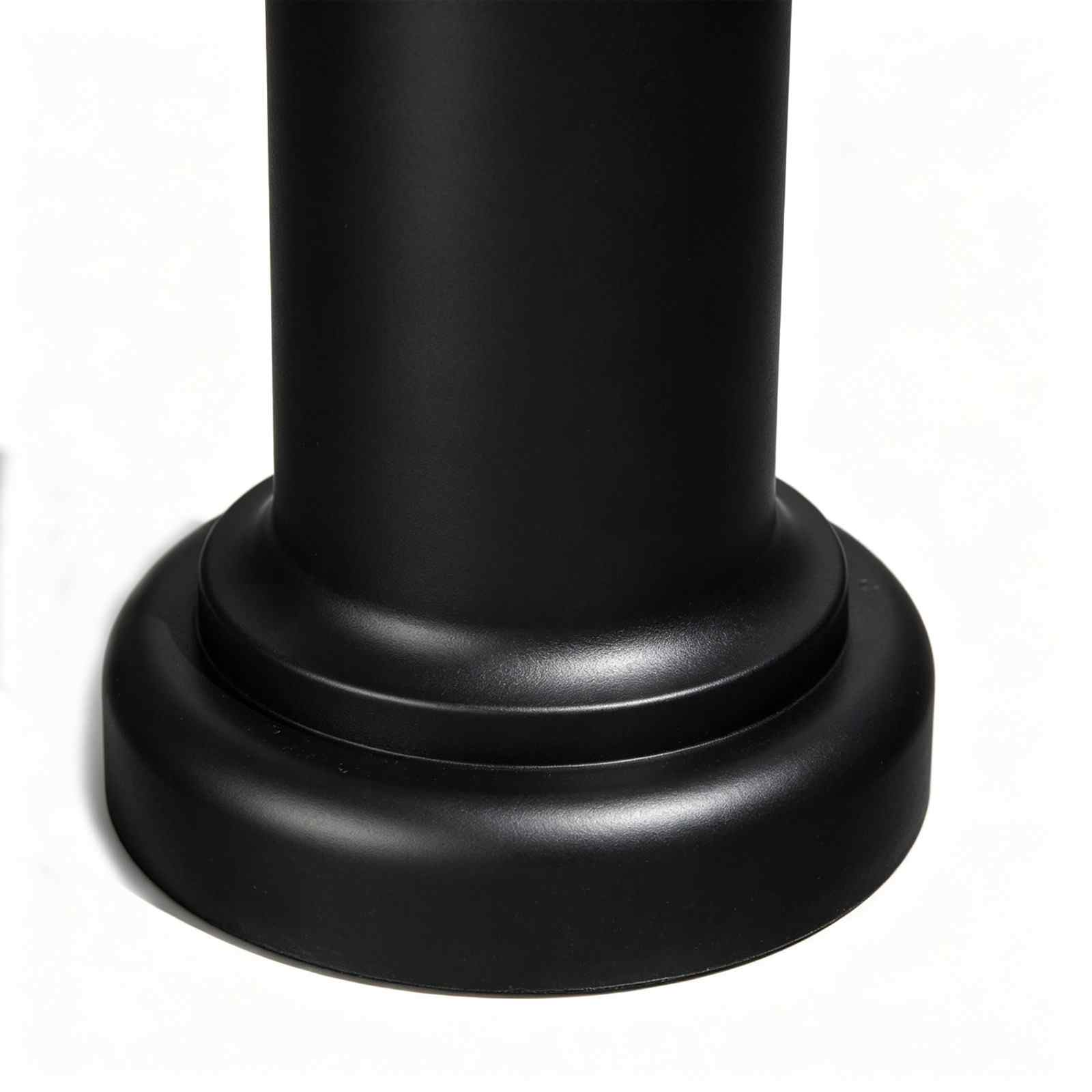 Black cast iron bollard base close up