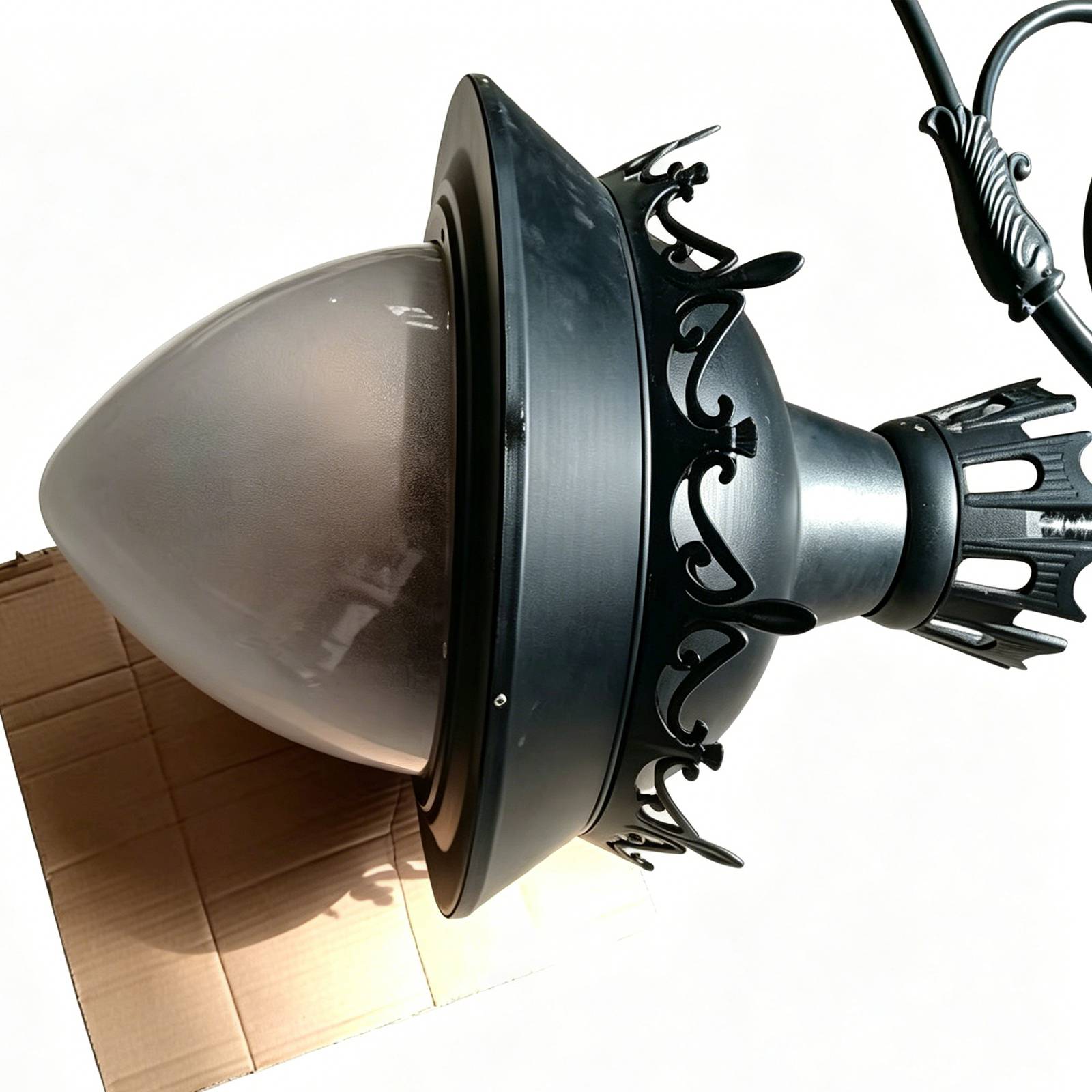 Close-up of HS-L053 lamp head featuring intricate scrollwork and frosted glass diffuser