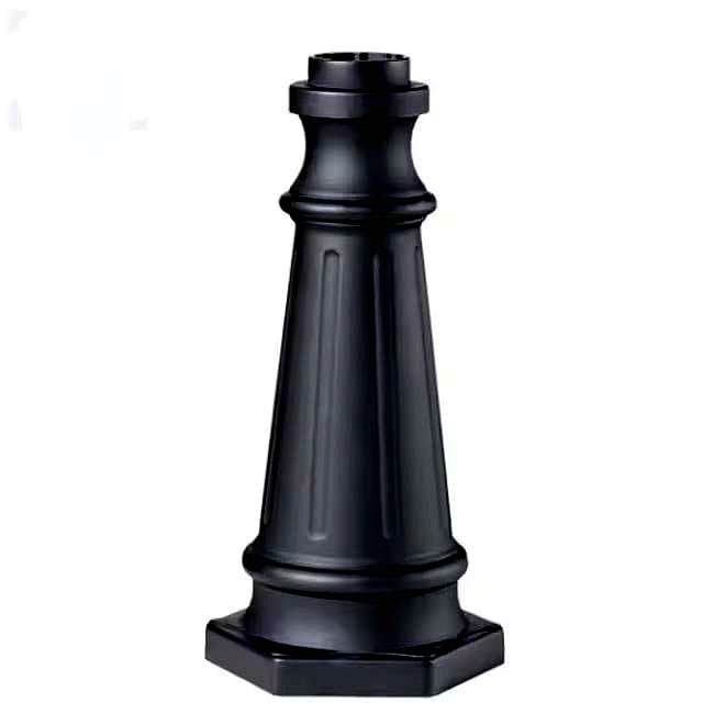 Black cast aluminium lamp base with vertical grooves and hexagonal base for street lamp post
